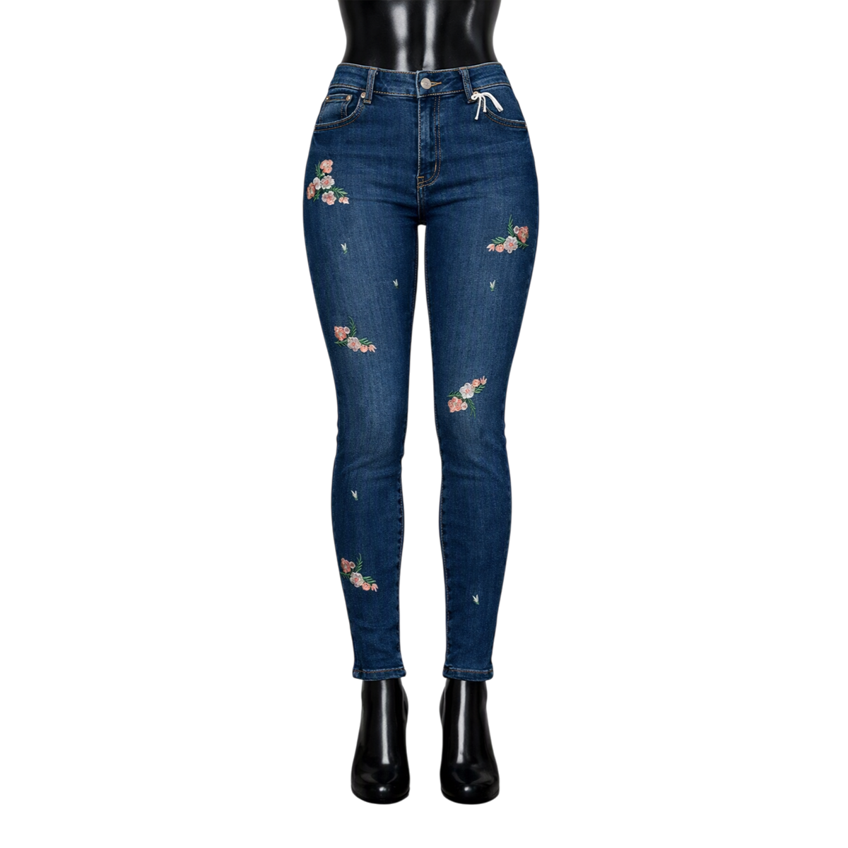 Pantalón entubado azul marino con flores en tonos rojos y blancos, de mezclilla para mujer, estilo ajustado y moderno.