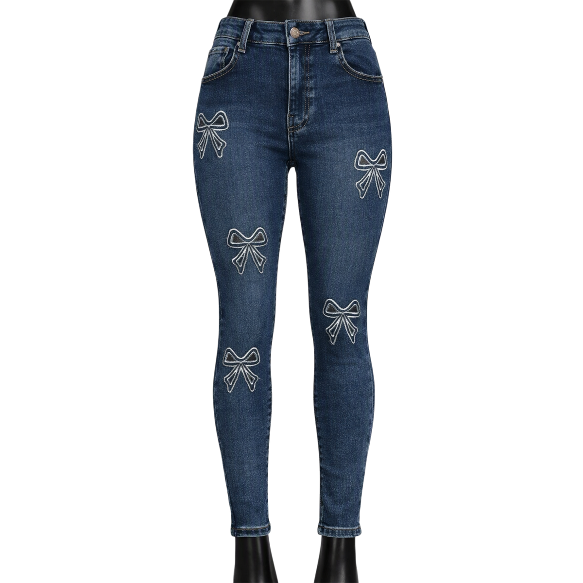 Pantalón entubado azul oscuro de mezclilla para mujer con moños tejidos, ajustado y de estilo moderno.