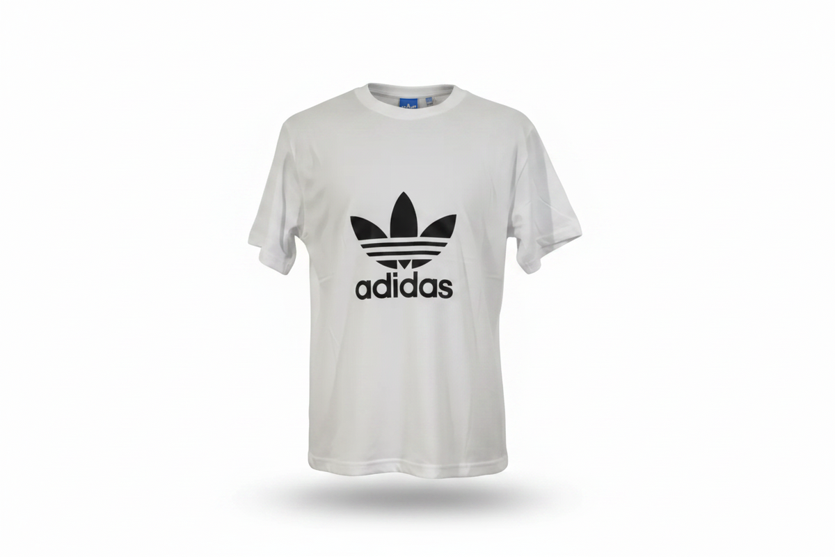 Playera premium Adidas blanca con logo negro en talla XL, diseñada por Selah Boutique, mostrando el frente de la prenda.