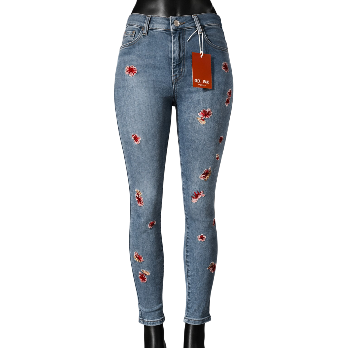 Pantalón entubado de mezclilla azul con detalles de flores bordadas por mujer, estilo moderno y cómodo.