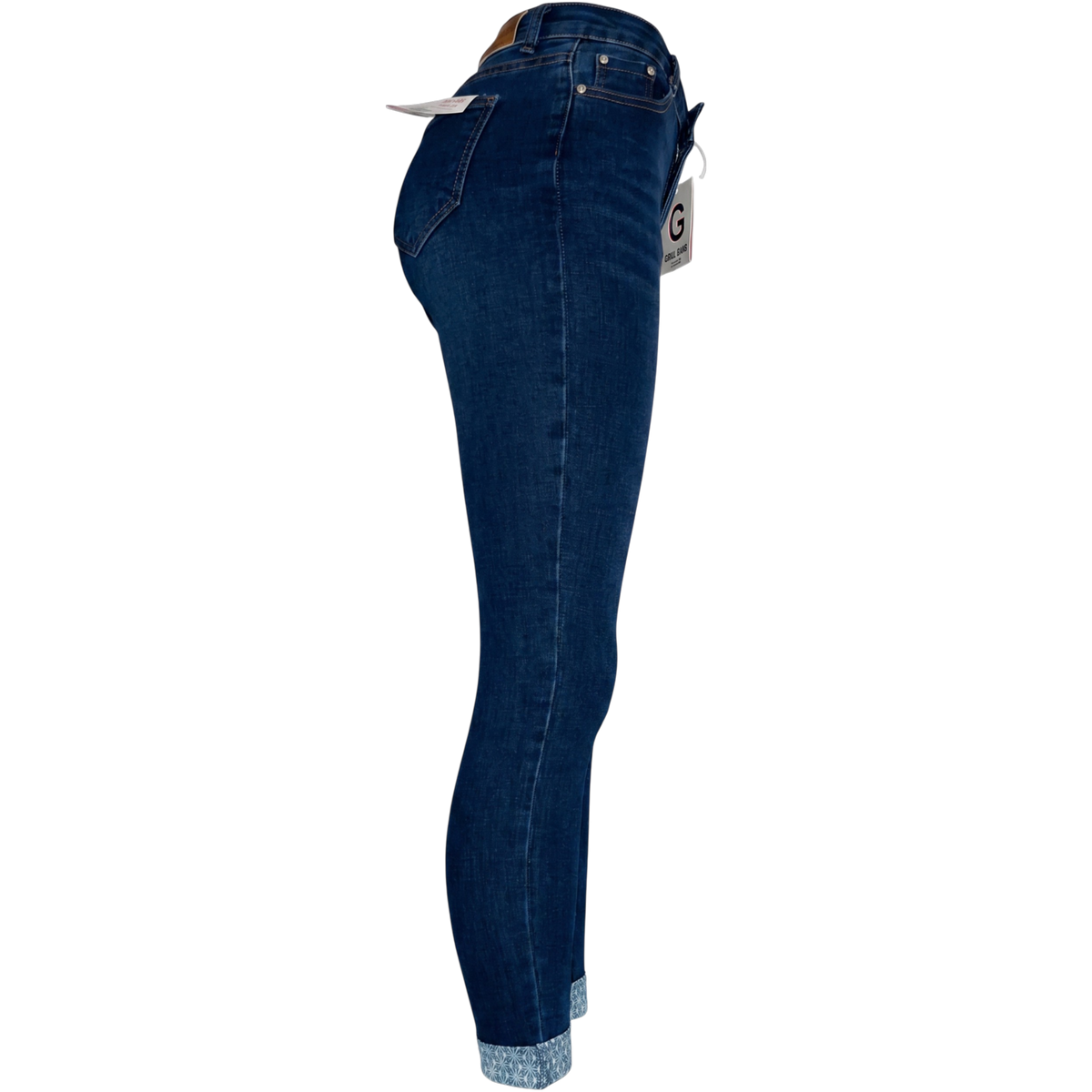 Pantalón entubado de mezclilla azul para mujer con detalle en el tobillo, de la marca My Store 2, vista lateral.