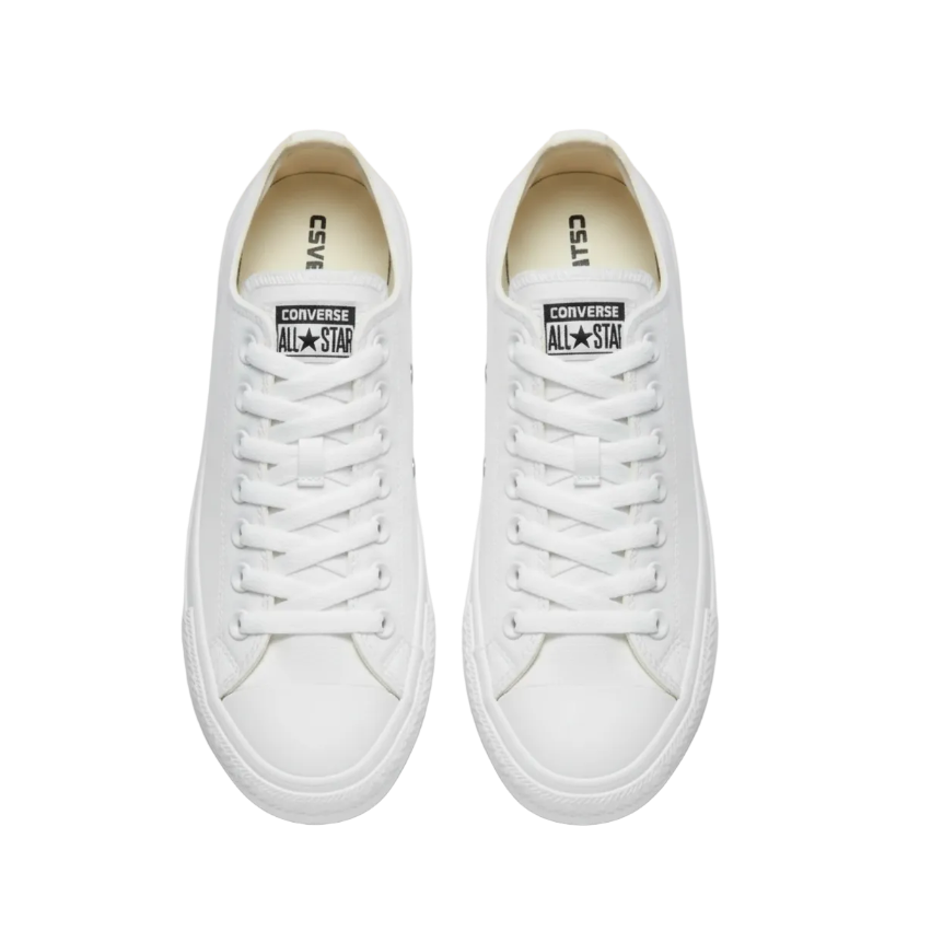 Tenis Converse Chuck Taylor All Star con suela de yute, color blanco, estilo clásico y diseño de lona, en un fondo neutro
