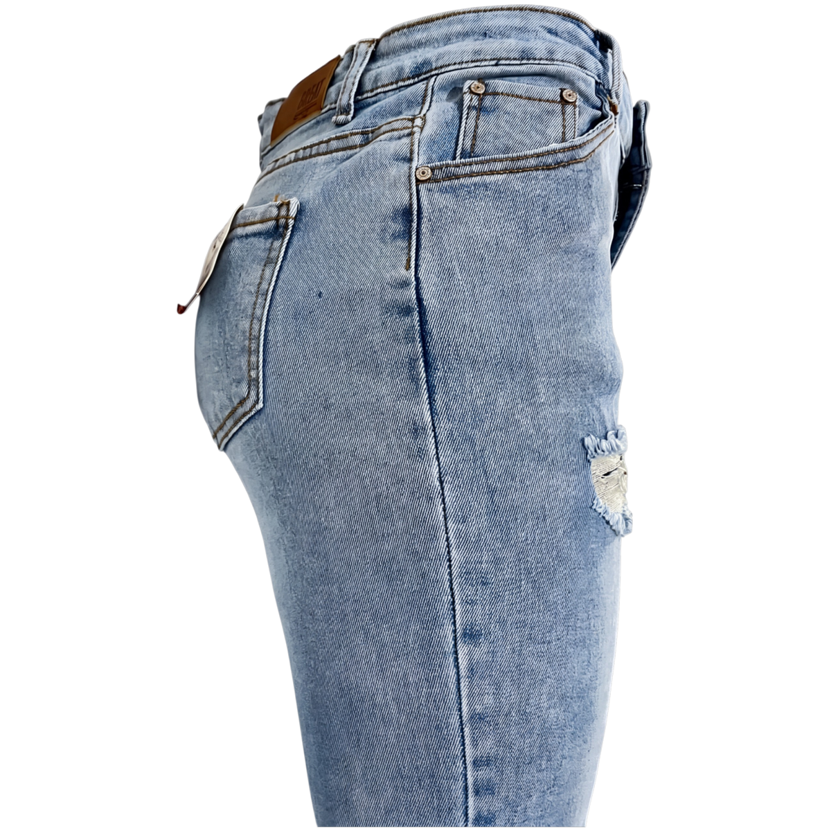 Pantalón entubado azul roto para mujer de mezclilla, vista lateral trasera mostrando detalles de desgastes y ajuste ajustado.